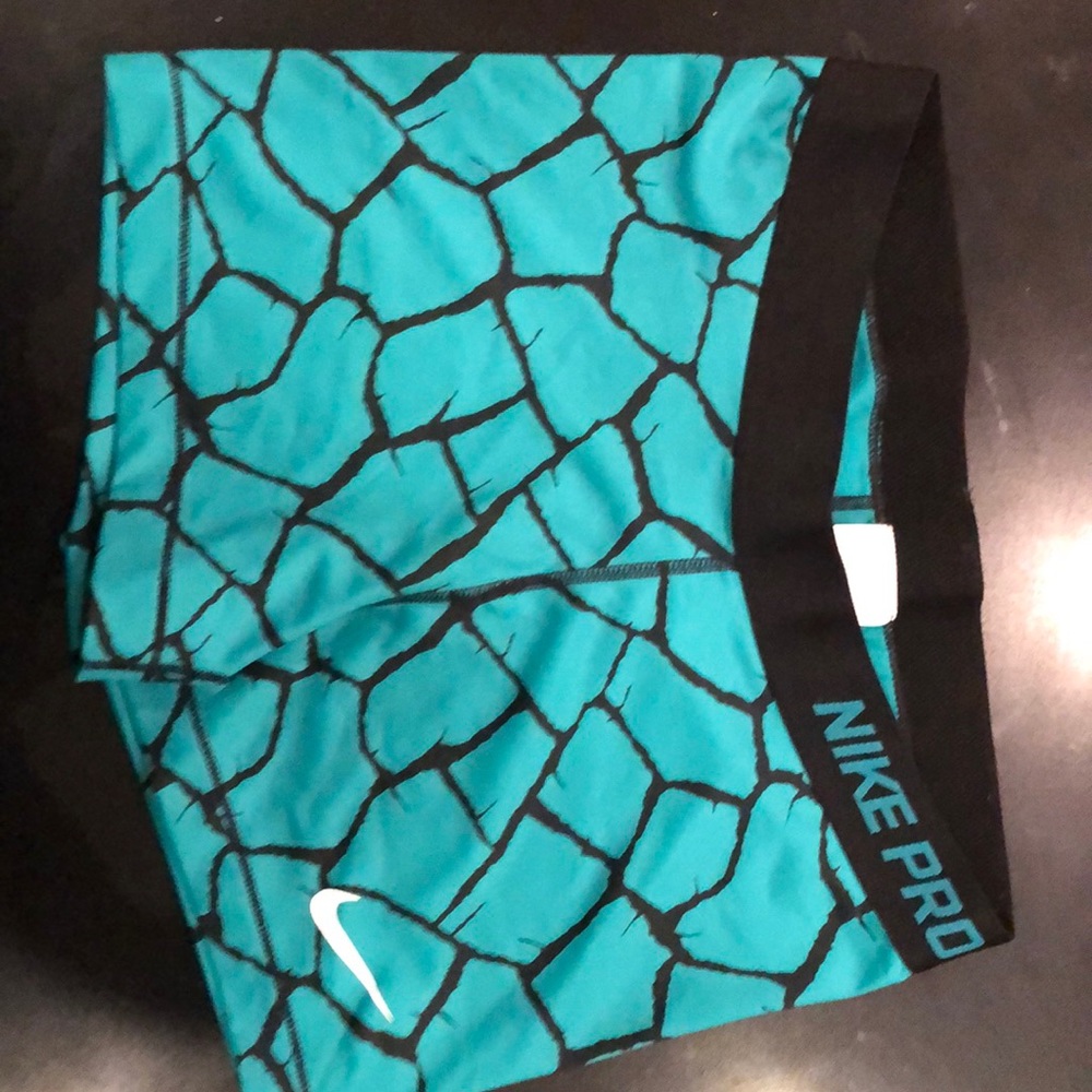 Real and black Nike Pro spandex shorts